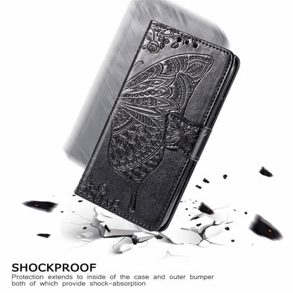 Black embossed leather flip wallet case with butterfly design, shown angled with debris