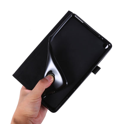 Black TPU shell tablet case with folio flap; hand lifting front cover.