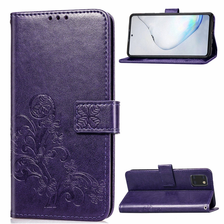 Purple phone folio wallet case with pressed flower embossing, card slots, and kickstand.