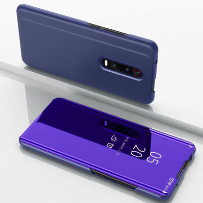 Dark blue horizontal flip phone case with purple mirrored stand and camera/port cutouts