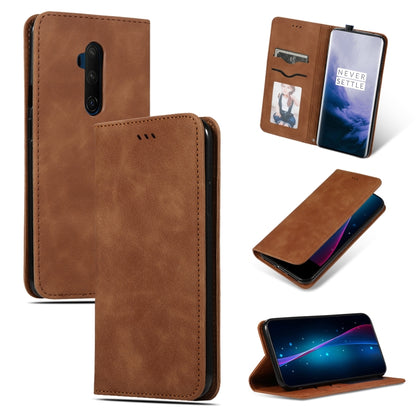 Brown leather flip phone case with card slots and camera cutout