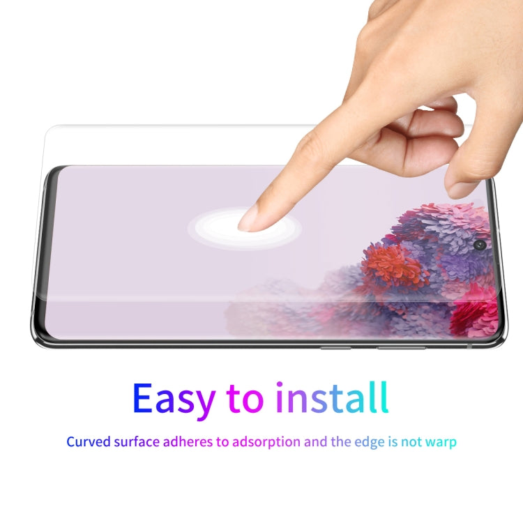 Clear curved PET screen protector film being pressed into place