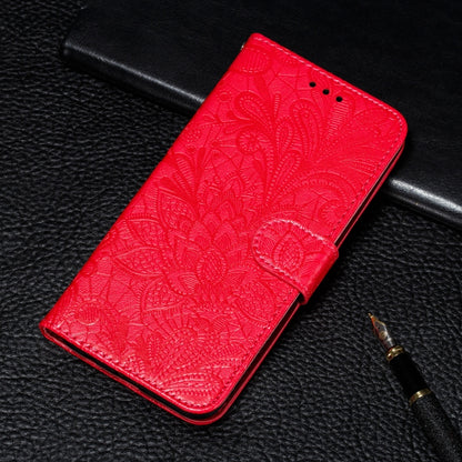 Red embossed floral wallet phone case featuring a folio flap