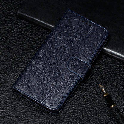 Dark blue leather phone wallet case with embossed lace floral pattern and card slots