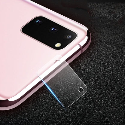 Tempered glass lens protector film placed over phone camera module with rounded edges