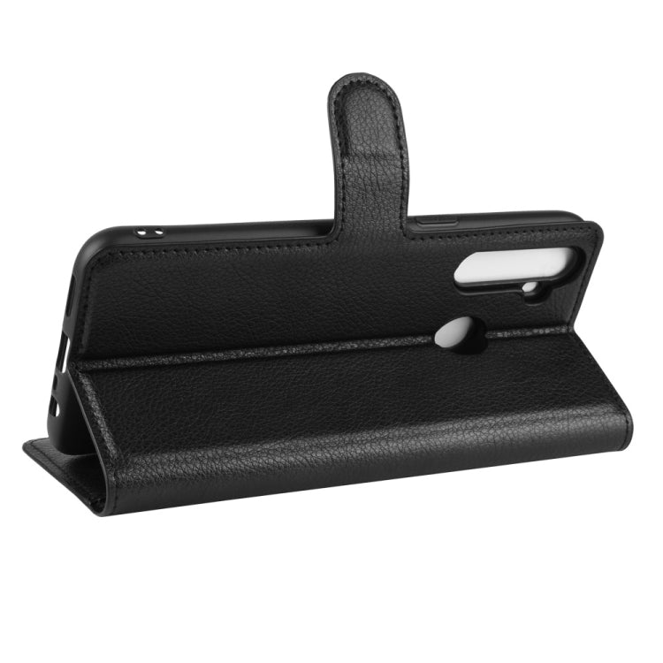 Black flip phone case with fold-out stand for viewing