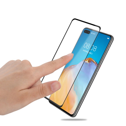 Tempered glass screen protector film for Huawei P40 being applied by hand