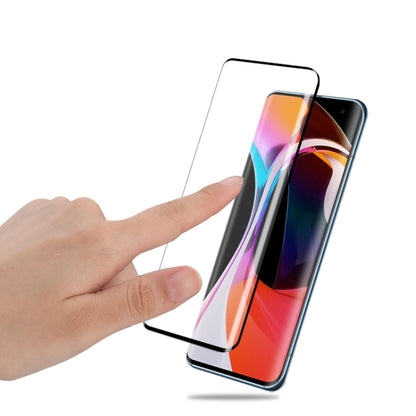 Clear tempered glass screen protector film for Xiaomi Mi 10 Pro, hand applying