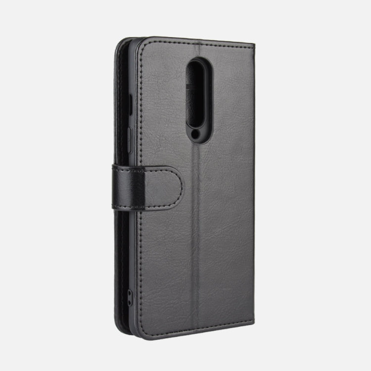 Gray flip phone case with textured finish and rear camera cutout