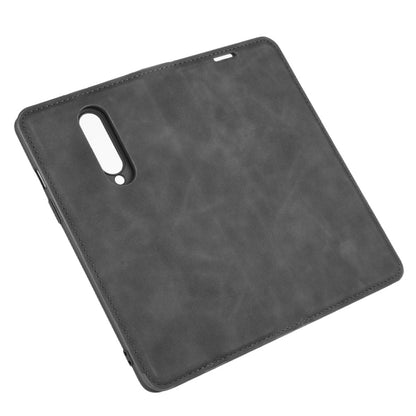 Black leather back cover case with cutout for camera and side access