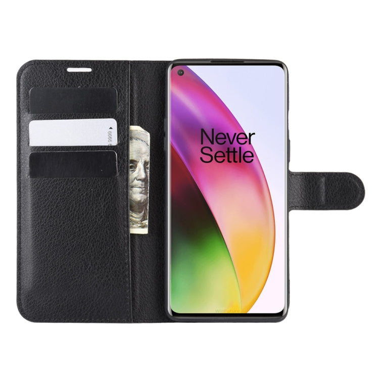 Black folio flip phone case with card slots and camera cutout, holding phone