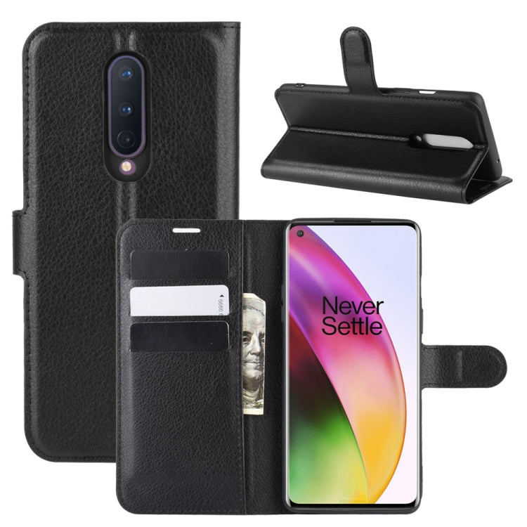 Black flip phone case with card slots, phone screen visible, and horizontal flip stand