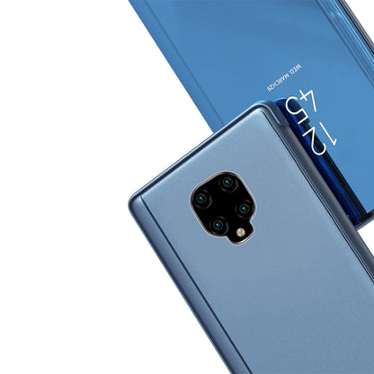 Blue mirror flip leather phone case with holder, close-up of the back camera cutout.