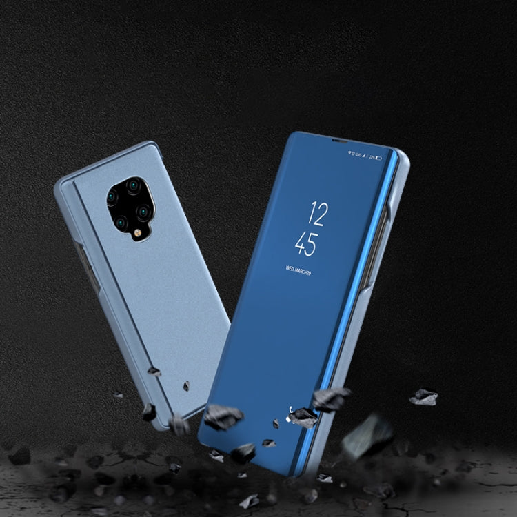 Light gray and blue mirror flip leather phone cases with holder, camera cutouts visible.