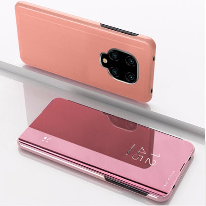 Rose gold mirror flip leather phone case with holder, rear camera cutout and mirror flap.
