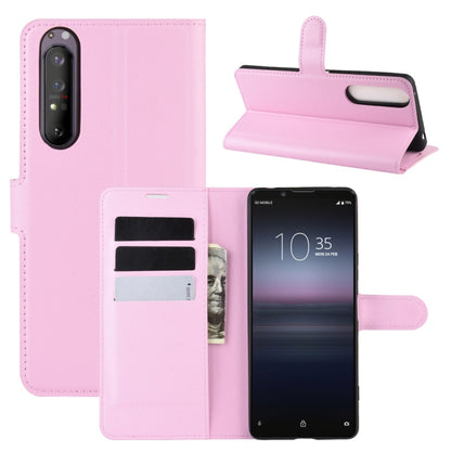 Pink litchi-texture horizontal flip phone wallet case with card slots and holder
