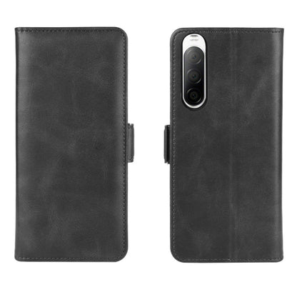 Black leather flip phone case with dual camera cutout and side magnetic strap tabs
