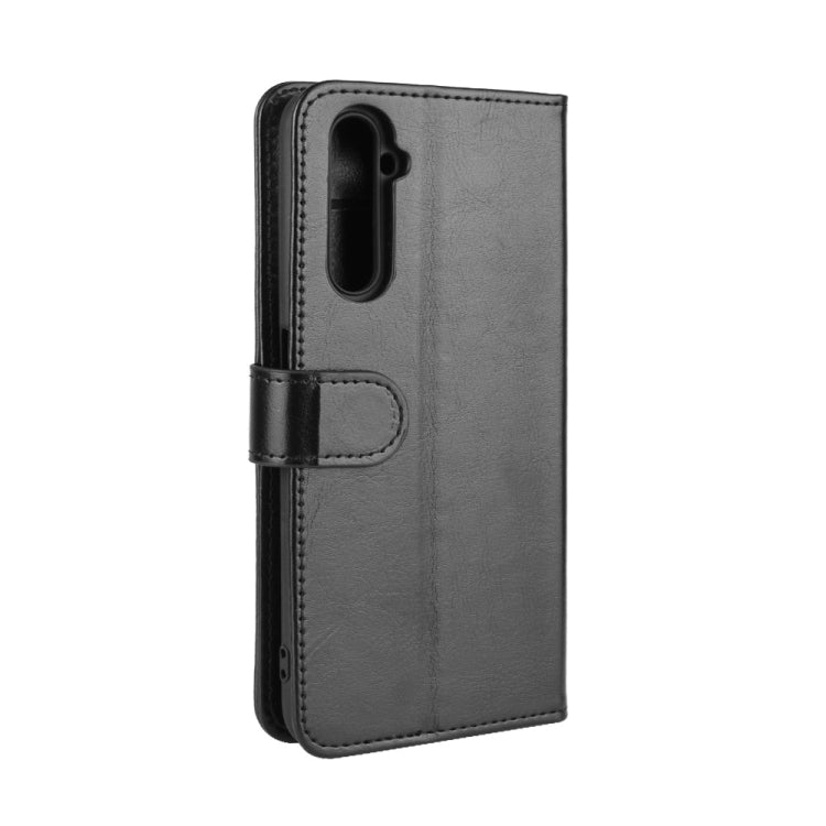Black textured flip protective phone case with camera cutout and side strap loop