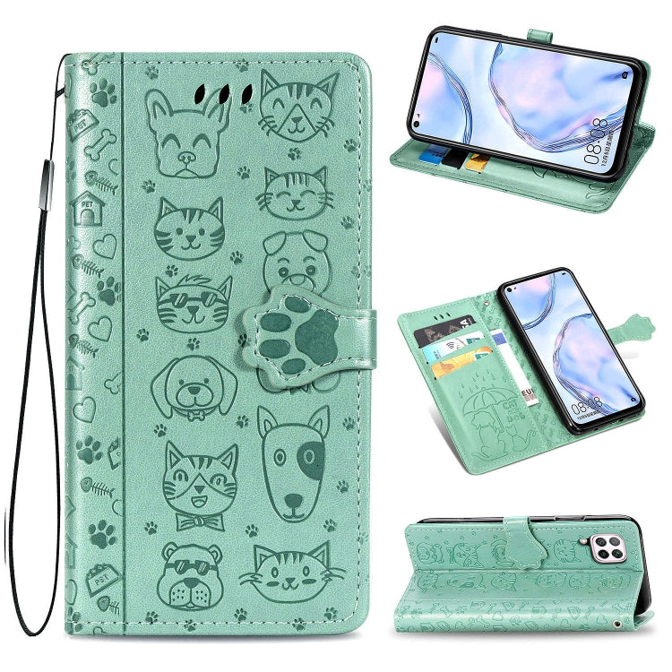 Mint green flip phone case with embossed cat and dog pattern, wallet style and strap.