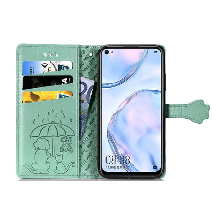 Mint green flip phone case open view with card slots and embossed cat-and-dog detail.