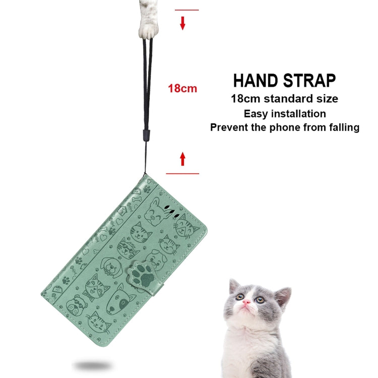Mint green folio phone case with lanyard strap, featuring embossed cat-and-dog pattern.