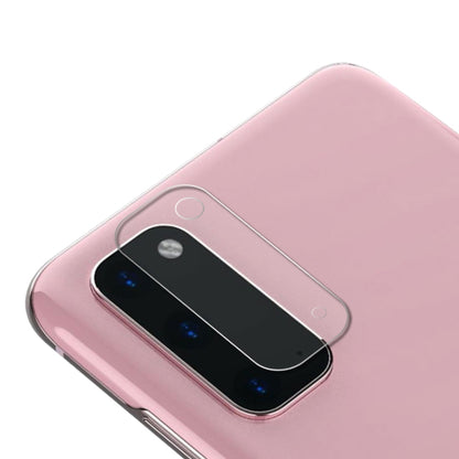 Rear camera lens tempered glass film on pink phone, clear rounded rectangular glass