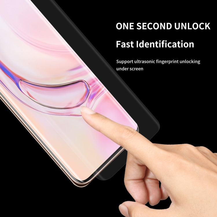 Curved transparent screen protector film applied over smartphone display