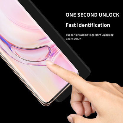 Curved transparent screen protector film applied over smartphone display