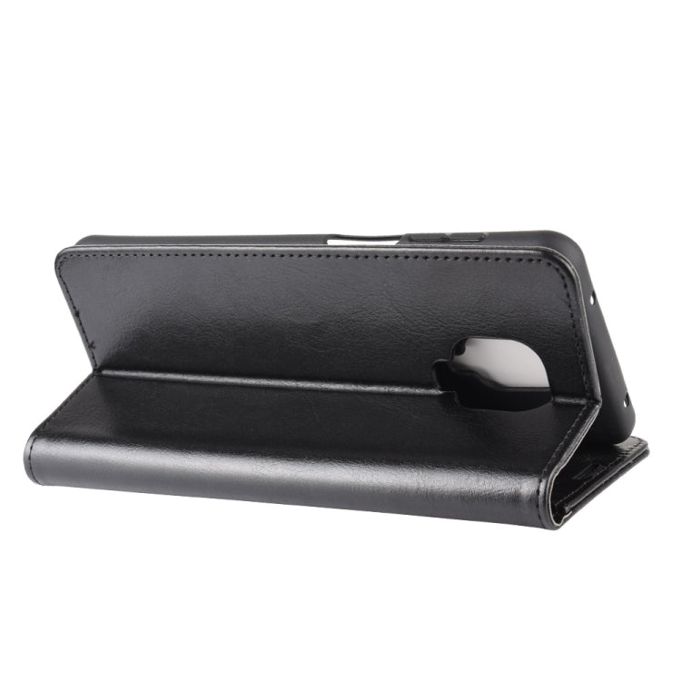 Black leather flip phone case with horizontal kickstand and camera cutout
