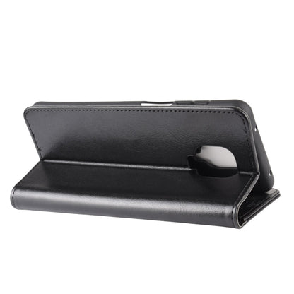 Black leather flip phone case with horizontal kickstand and camera cutout