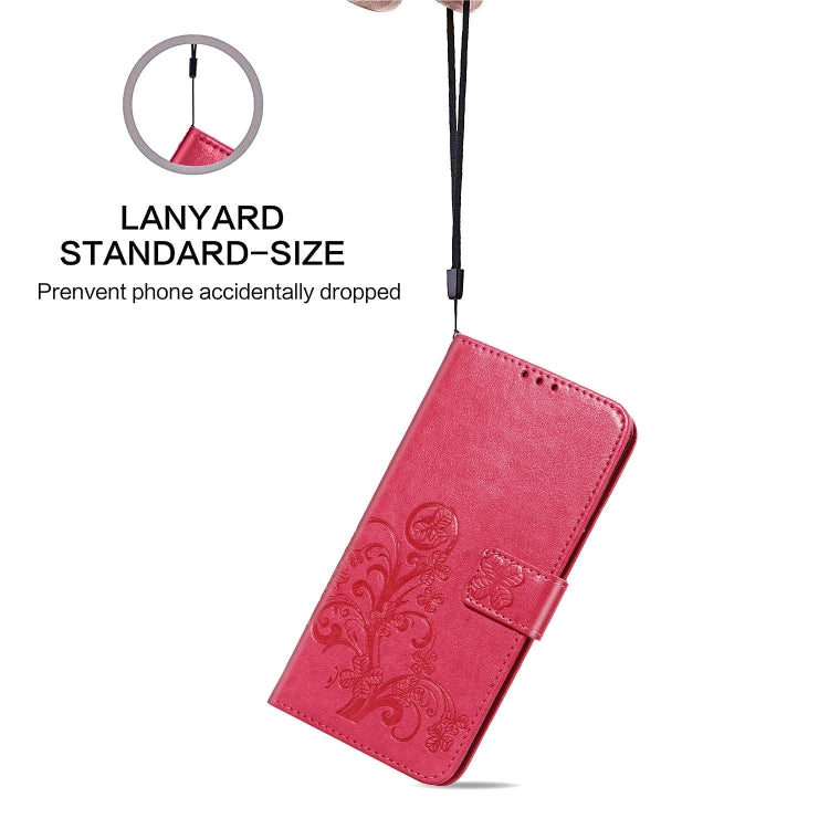 Rose leather phone wallet case with pressed clover floral pattern and hand strap