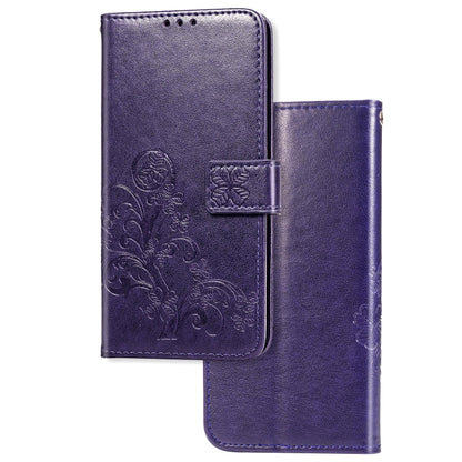 Purple leather phone wallet case with pressed clover floral pattern, card slots, flip cover