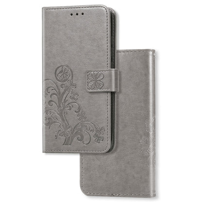 Gray leather phone wallet case with pressed clover floral pattern and card-holding flip cover