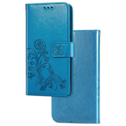 Blue leather phone wallet case with pressed clover floral pattern and attached card sleeve