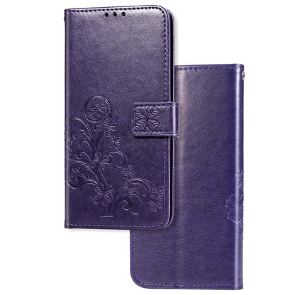 Purple floral embossed flip wallet phone case with card slots and magnetic closure