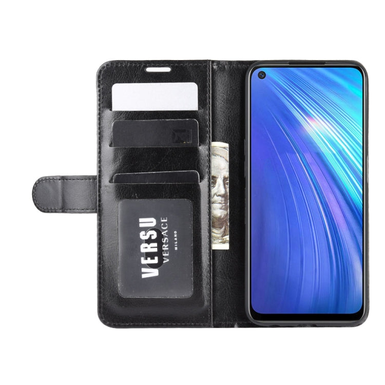 Black flip wallet phone case with card slots and phone installed front display cutout