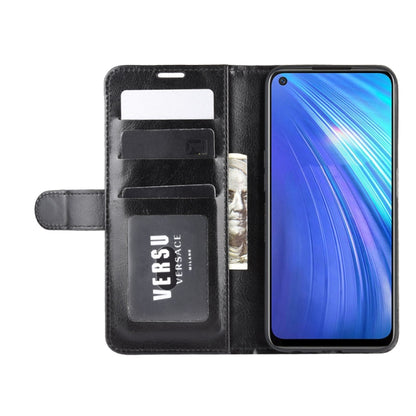 Black flip wallet phone case with card slots and phone installed front display cutout