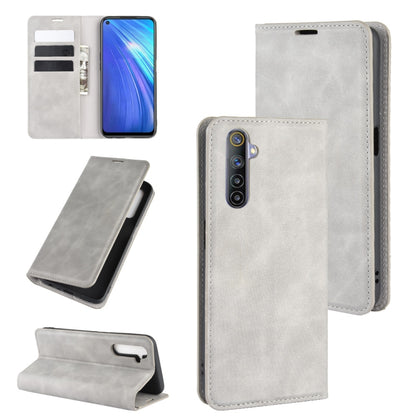 Grey leather phone wallet case with card slots, magnetic flap, and stand view