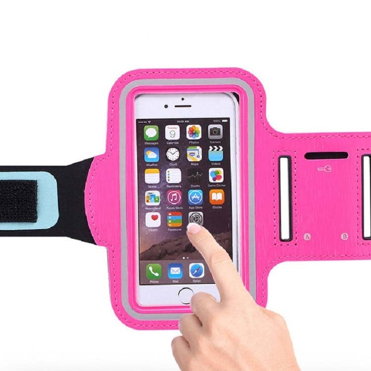 Pink armband phone bag with clear touchscreen window and finger touching phone screen