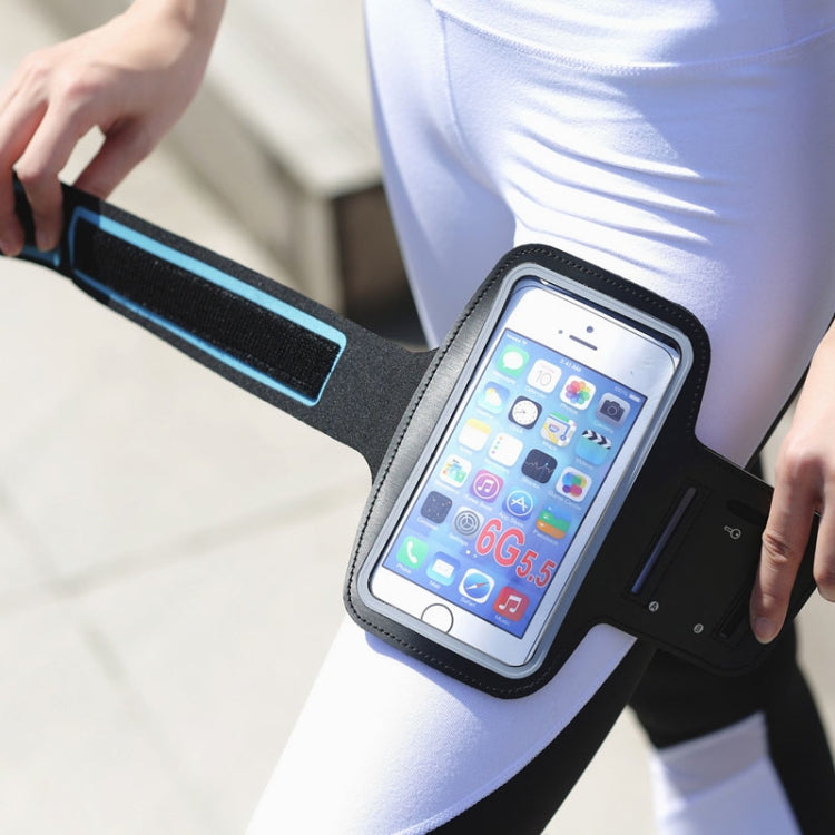 Black armband phone holder with touch-screen window holding a smartphone