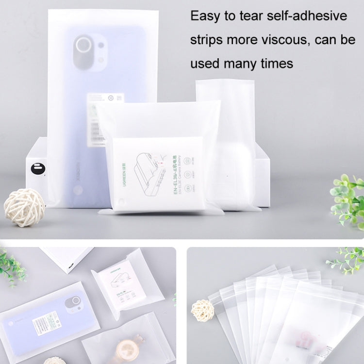 Matte white self-adhesive CPE bags with tear-open strip, shown stacked