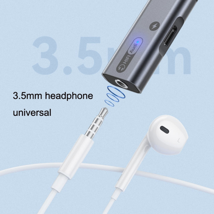 Gray USB-C adapter with 3.5mm headphone output and charging port