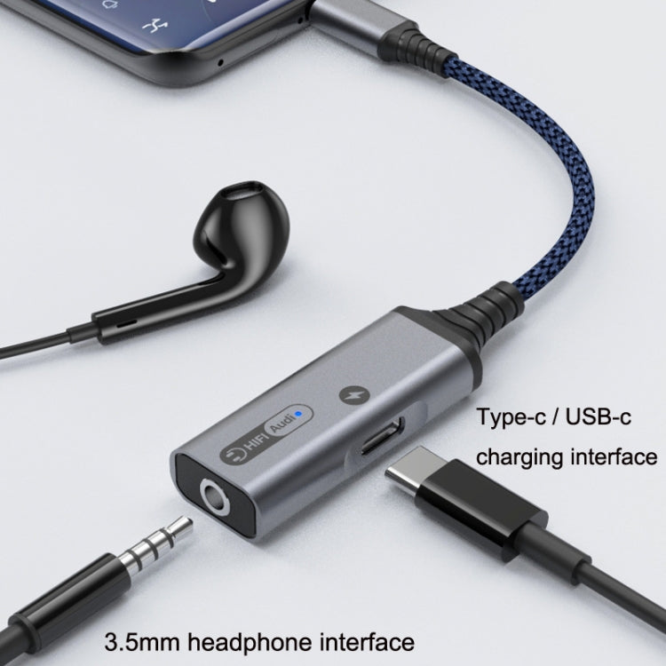 USB-C audio and charging adapter with 3.5mm headphone jack and USB-C plug