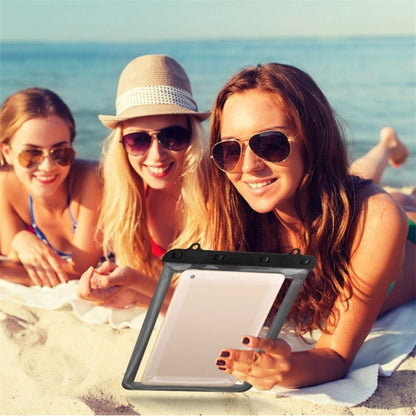 Waterproof tablet bag worn outdoors on a beach, clear window protects tablet