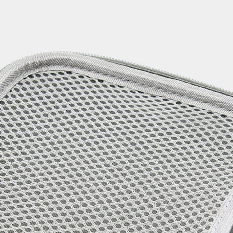 Gray mesh interior panel inside zippered cable storage bag