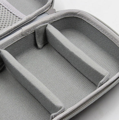 Gray interior organizer with divider straps inside zippered storage bag