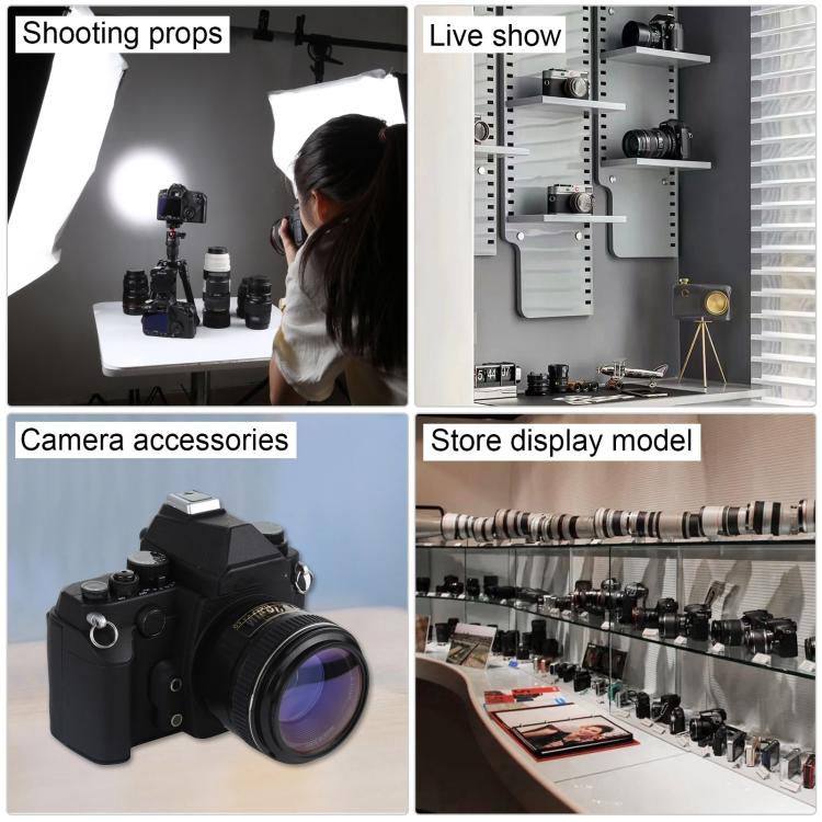 Black DSLR-style fake camera model used as display and shooting prop