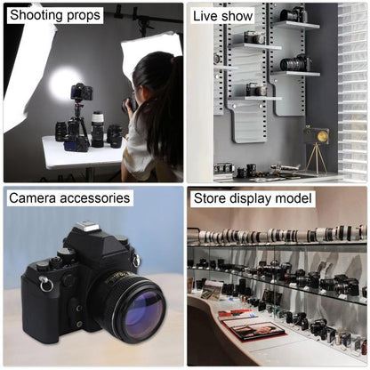 Black DSLR-style fake camera model used as display and shooting prop