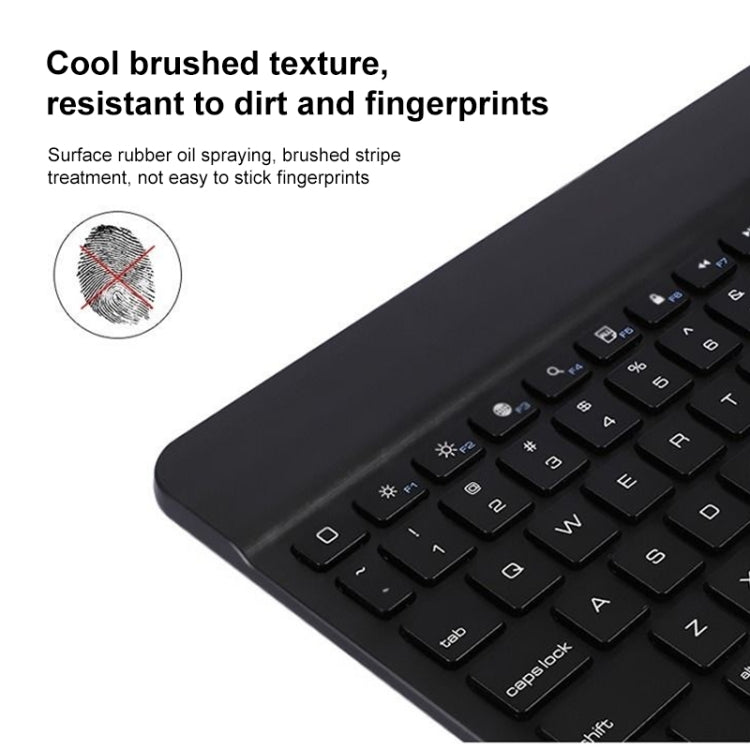 Black mini Bluetooth keyboard with textured edge and visible keycaps.