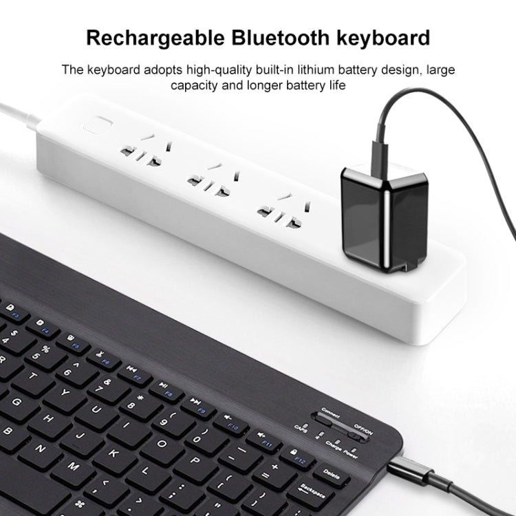 White rechargeable mini Bluetooth keyboard with charging cable and compact dock.